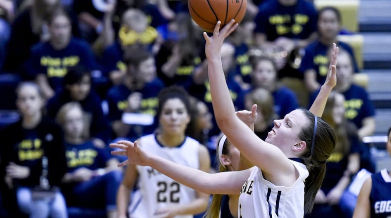Monroe’s Katie Sloneker puts up a shot during their game against Edgewood on Dec. 10, 2015, at Monroe. NICK GRAHAM/STAFF