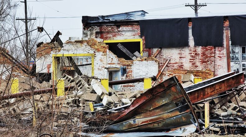 The Butler County commissioners agree to spend some of their $74.4 million in American Rescue Plan Act funds to demolish the Middletown Paperboard building that was ruined by a massive fire in 2020. NICK GRAHAM / STAFF