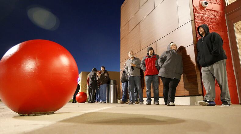 A short line formed at Target in Centerville for a 7 a.m. Black Friday opening. TY GREENLEES / STAFF