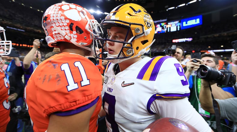 NEW ORLEANS, LOUISIANA - JANUARY 13: Joe Burrow #9 of the LSU Tigers congratulates Isaiah Simmons #11 of the Clemson Tigers after their 42-25 win in the College Football Playoff National Championship game at Mercedes Benz Superdome on January 13, 2020 in New Orleans, Louisiana. (Photo by Mike Ehrmann/Getty Images)