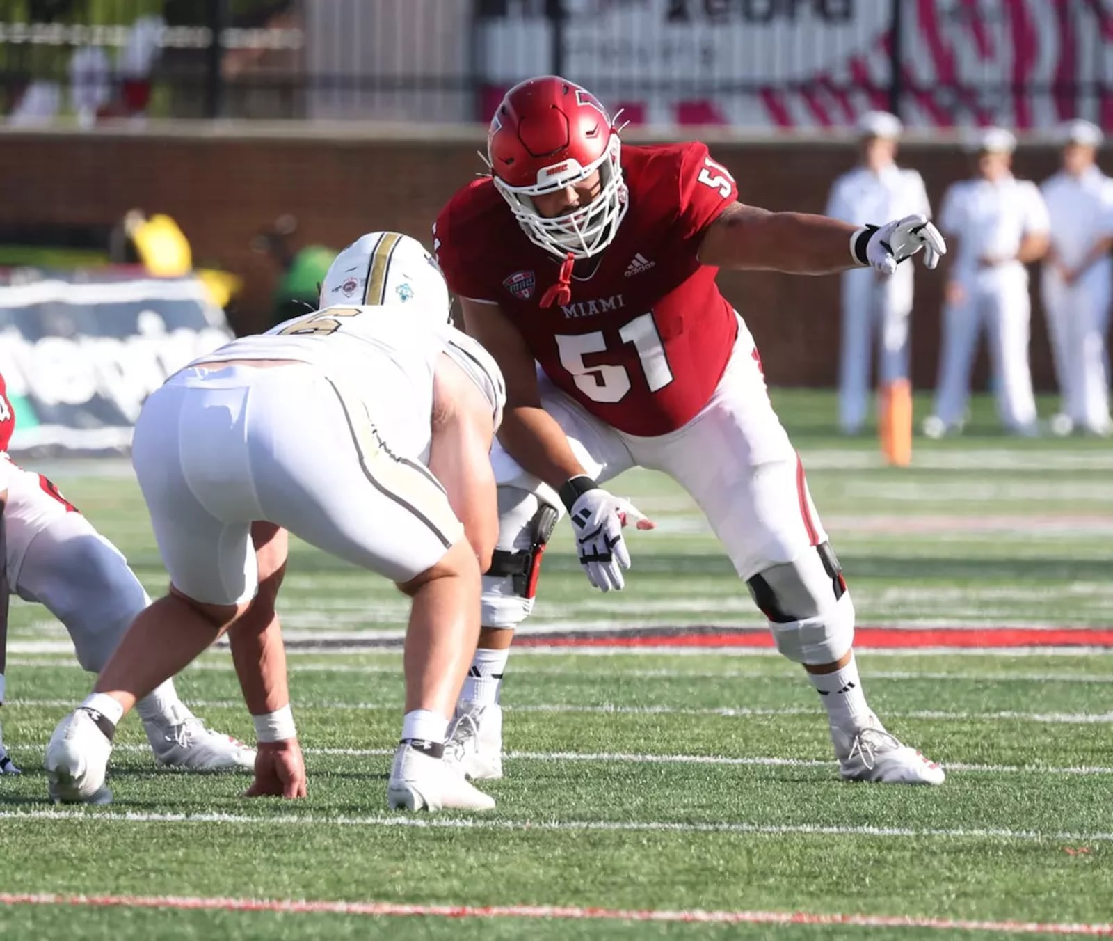 Miami offensive lineman Eric Smith signals toward the Lindenwood defense on Saturday at Yager Stadium. MIAMI ATHLETICS