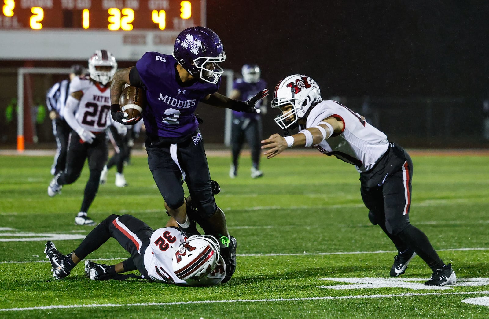Middletown's Ace Cooper runs the ball after a reception during their Division I Regional football final against Wayne Friday, Nov. 21, 2025 at Trotwood Madison High School. Middletown won 21-14 to advance. NICK GRAHAM/STAFF