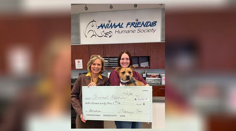 Thanks to Butler County dog owners and the Butler County Auditor’s partnership with DocuPet, additional funds have been allocated to the Animal Friends Humane Society, the county’s animal shelter. On April 10, Auditor Nancy Nix presented a check for $13,073.62 to Intake Coordinator Megan Poffenbarger of Animal Friends. The donation was on behalf of DocuPet, the auditor’s official dog licensing partner. This gift was made possible via DocuPet’s Safe&Happy Fund, which collects automatic donations through designer license tag purchases and direct donations made by residents. CONTRIBUTED