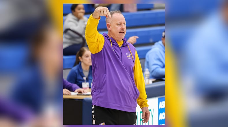 Bellbrook coach Jason Tincher motions to officials during a Division III second-round game against Fairborn on Friday, Feb. 20 at Springfield High School. BRYANT BILLING / STAFF