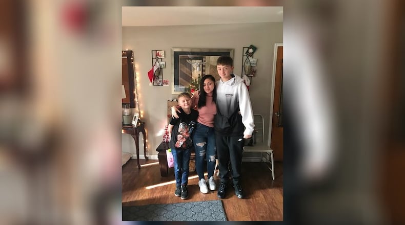 Skye Coker of Butler Tech pictured with two of her brothers. CONTRIBUTED