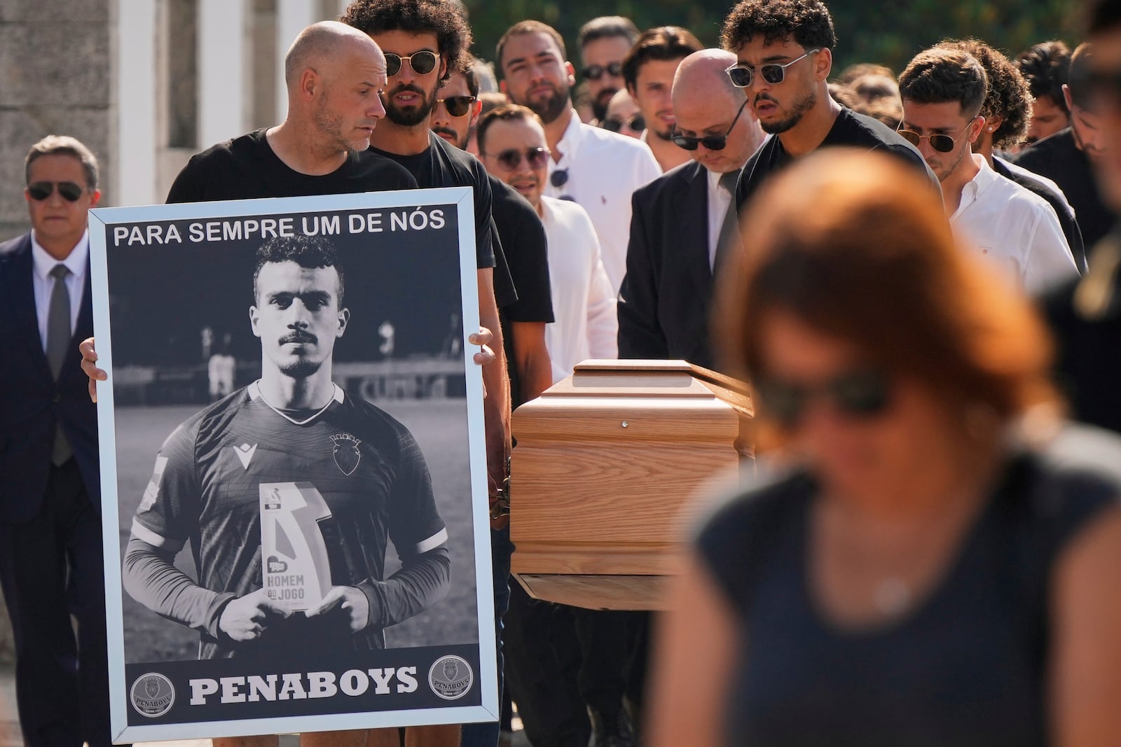 The coffins of Diogo Jota and his brother André Silva are carried into the church during their funeral in Gondomar, near Porto, Portugal, on Saturday, July 5, 2025. (AP Photo/Manu Fernandez)
