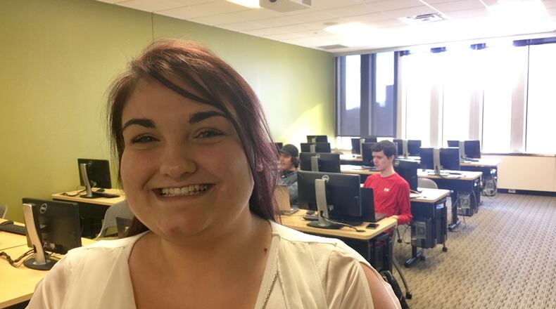 Cincinnati State Middletown campus student Tabetha Sanders is part of the downtown school’s increasingly popular business management program. The college’s centralized location — in downtown’s former Cincinnati, Gas & Electric Co. building — fosters a closeness and ease many larger universities lack, she says. MICHAEL D. CLARK/STAFF