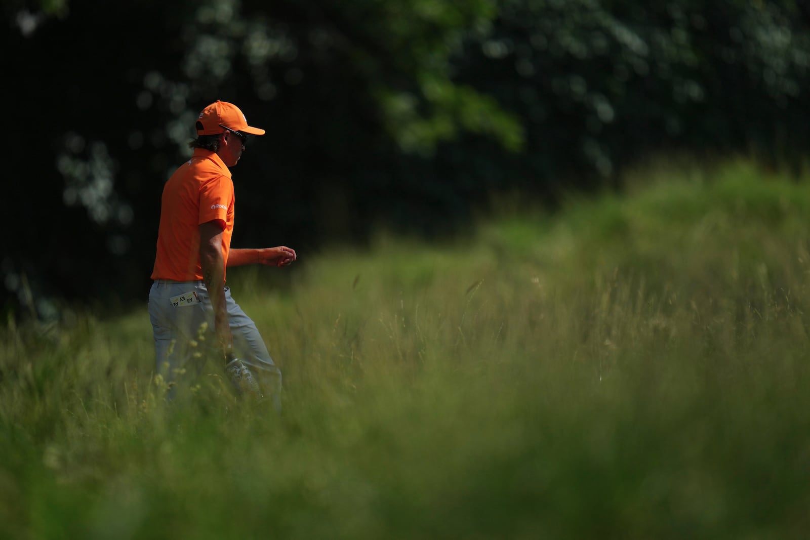Rickie Fowler walks toward the 17th green during the final round of the Charles Schwab Challenge golf tournament at Colonial Country Club in Fort Worth, Texas, Sunday, May 25, 2025. (AP Photo/Julio Cortez)