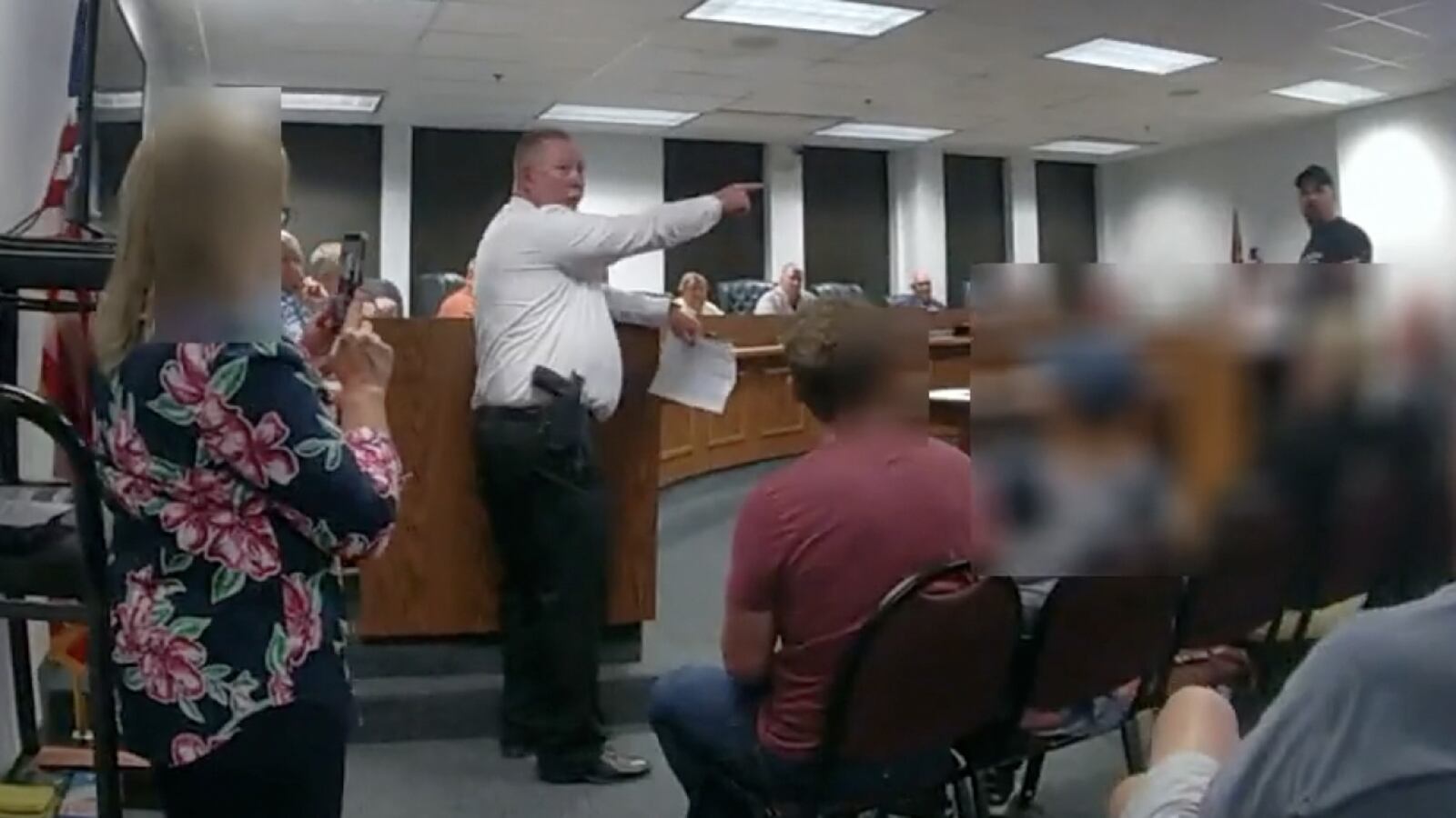 Wilmington Police Chief Ronald Fithen yells "jail" for Darrell Petrey for allegedly 'disrupting' a city council meeting in April. The charge was dismissed. CREDIT: Wilmington Police Department BWC video screenshot