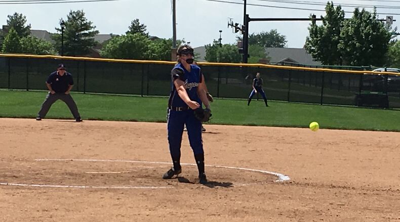 Cincinnati Christian’s Briahna Bush sends a pitch toward the plate during a Division IV district final May 19 against Bradford at Mason. RICK CASSANO/STAFF