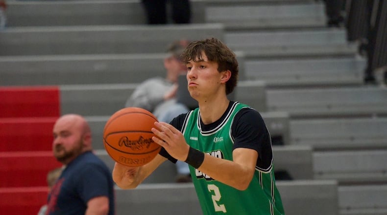 Badin's Carson Lowe makes a pass during his Division III tournament game against Talawanda on Friday night at Princeton. LAYTON HARTSOUGH / CONTRIBUTED