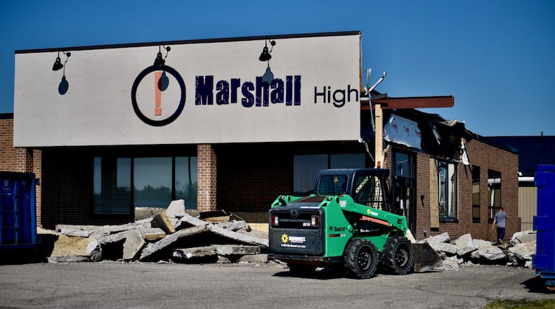 Summertime isn’t break time for some area schools as millions of dollars in new construction expands existing schools at private and public schools in Butler and Warren counties. Marshall High School in Middletown is more than doubling its number of learning labs while Rosa Parks Elementary in the public city schools is also expanding. Badin High School in Hamilton is adding to its campus and Carlisle Schools in Warren County will open a new, pre-K-12 school in early September. (File And Provided Photos/Journal-News)