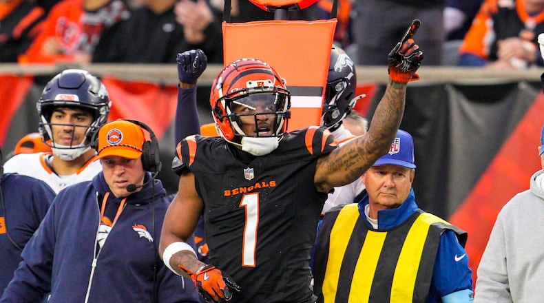 Cincinnati Bengals wide receiver Ja'Marr Chase (1) celebrates after a first down against the Denver Broncos during the first half of an NFL football game in Cincinnati, Dec. 28, 2024. AP PHOTO/JEFF DEAN