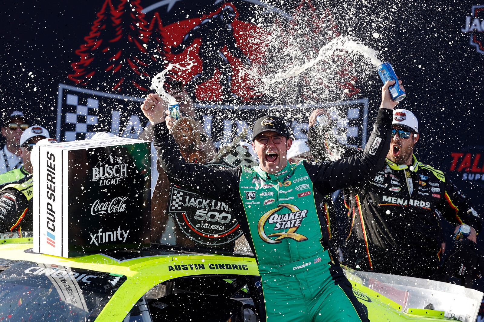 NASCAR Cup Series driver Austin Cindric celebrates after winning a NASCAR Cup Series auto race at Talladega Superspeedway, Sunday, April 27, 2025, in Talladega, Ala. (AP Photo/Butch Dill)