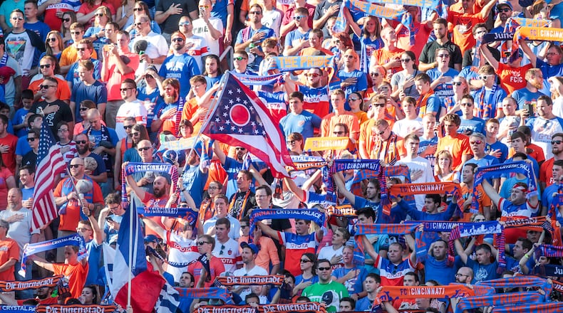 Fans cheer on the FC Cincinnati team as they play English Premier League team Crystal Palace in a friendly match Saturday, July 16 at Nippert Stadium in Cincinnati. NICK GRAHAM