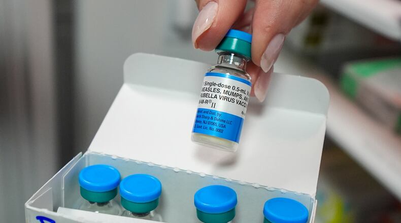 FILE - Vials of the measles mumps and rubella (MMR) vaccine are displayed in Lubbock, Texas, on Tuesday, Feb. 25, 2025. (AP Photo/Julio Cortez, File)