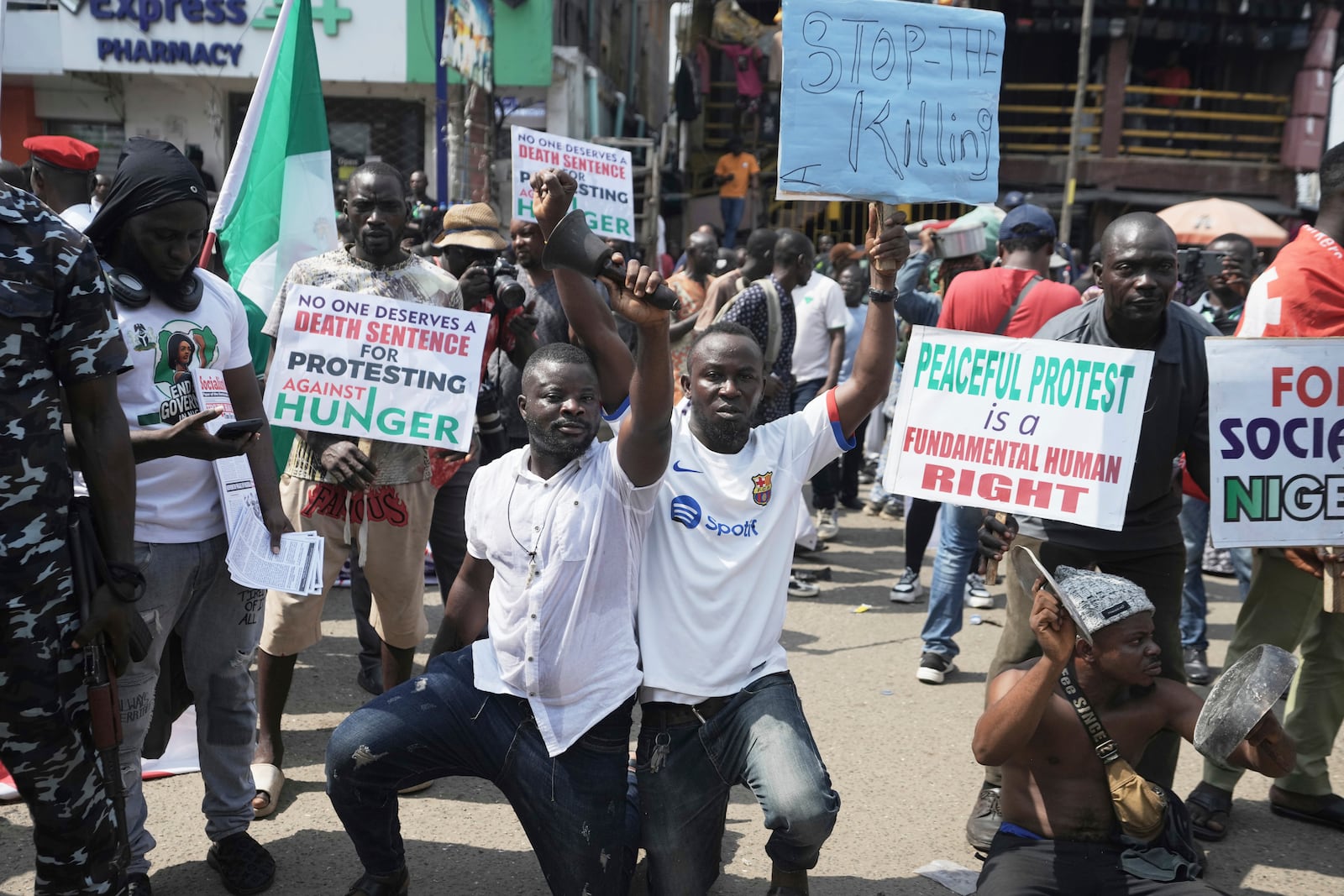 People gather for anti-government protests on the streets of Lagos Nigeria, Thursday, June 12, 2025. (AP Photo/Sunday Alamba)