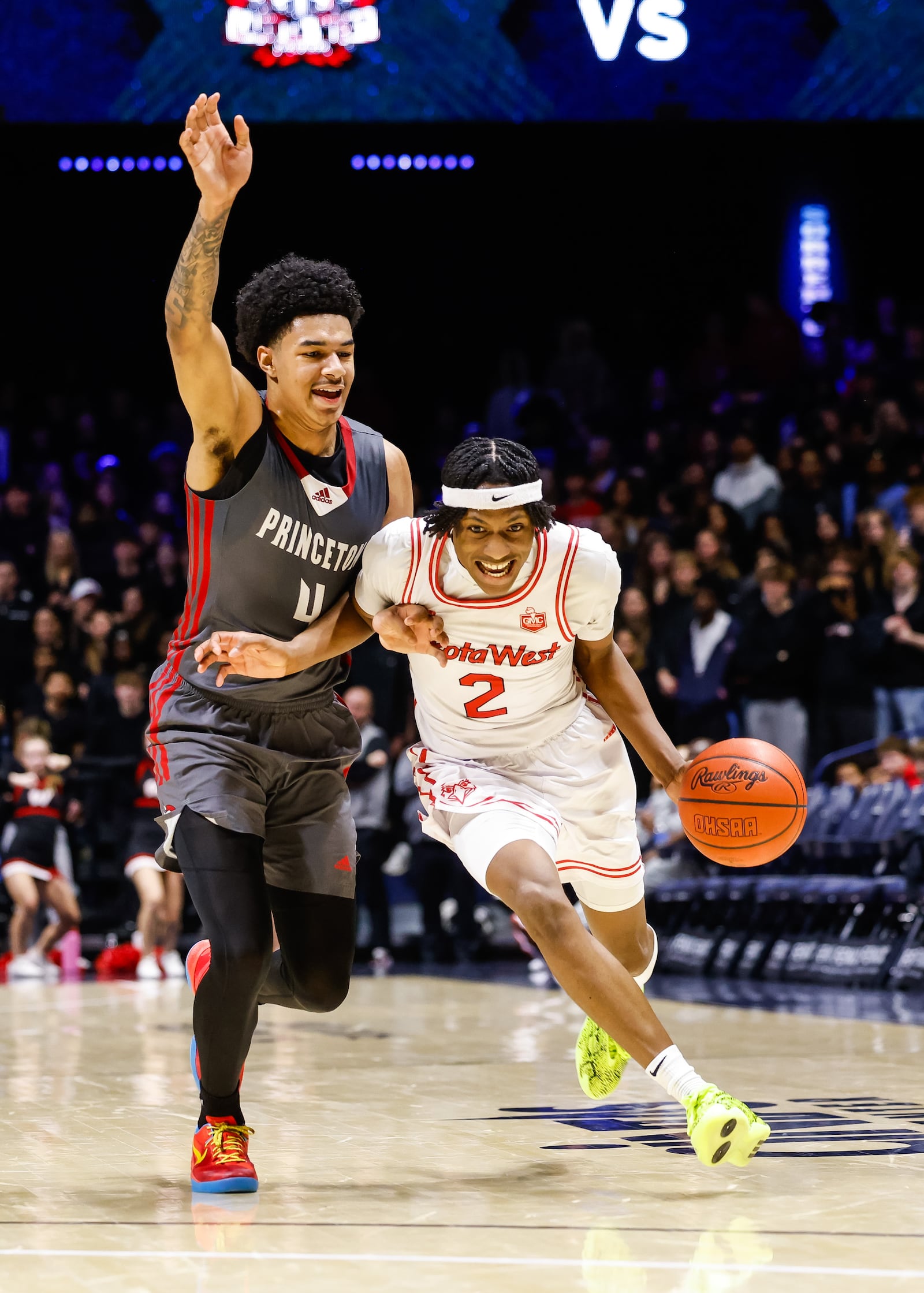 Lakota West's Joshua Tyson dribbles the ball defended by Princeton's Kam Mercer during their basketball game Friday, Feb. 6, 2026 at Xavier University's Cintas Center. Lakota West defeated Princeton 58-53. NICK GRAHAM/STAFF