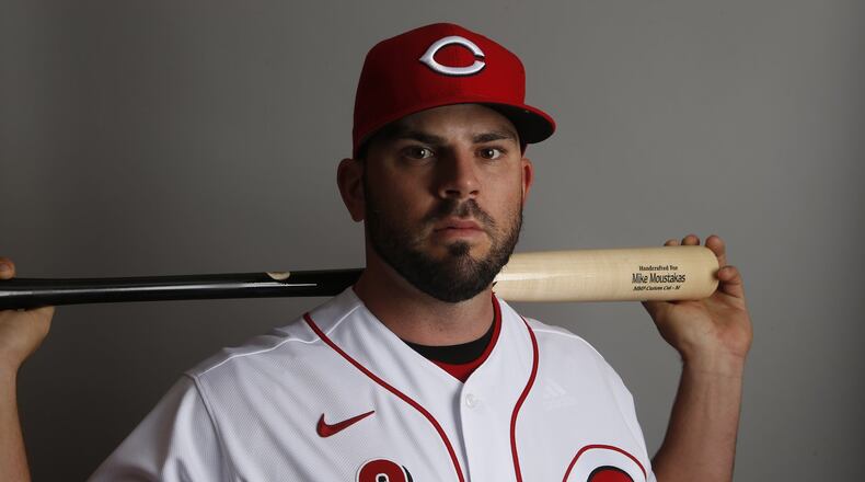 Cincinnati Reds second baseman Mike Moustakas poses for a photograph during spring training baseball photo day Wednesday, Feb. 19, 2020 in Goodyear, Ariz. (AP Photo/Ross D. Franklin)