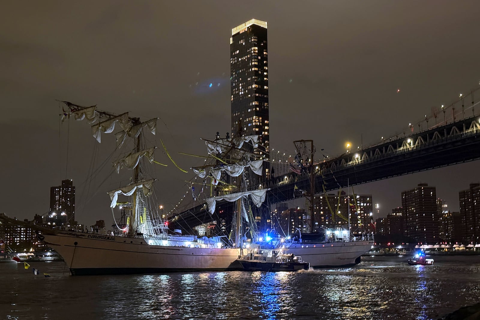 A masted Mexican Navy training ship, the Cuauhtémoc, sits stranded after colliding with the Brooklyn Bridge after, Saturday, May 17, 2025, in New York. (AP Photo/Kyle Viterbo)