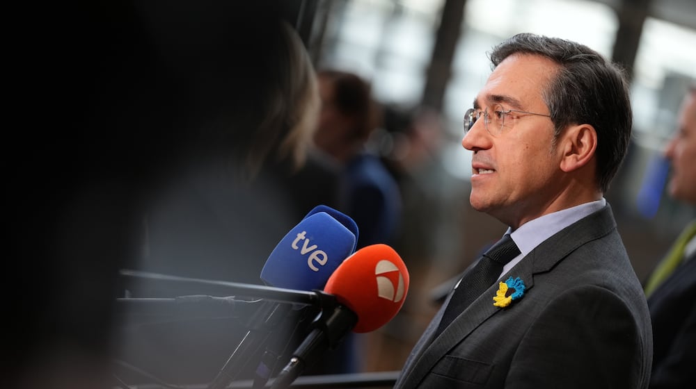 Spain's Foreign Minister Jose Manuel Albares Bueno speaks with the media as he arrives for a meeting of EU foreign ministers at the European Council building in Brussels, Monday, Feb. 23, 2026. (AP Photo/Virginia Mayo)