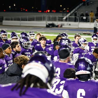 Middletown head football coach Kali Jones speaks to the team after their Division I State semifinal football game against St. Xavier Friday, Nov. 28, 2025 at Welcome Stadium in Dayton. The Bombers won 21-6. NICK GRAHAM/STAFF