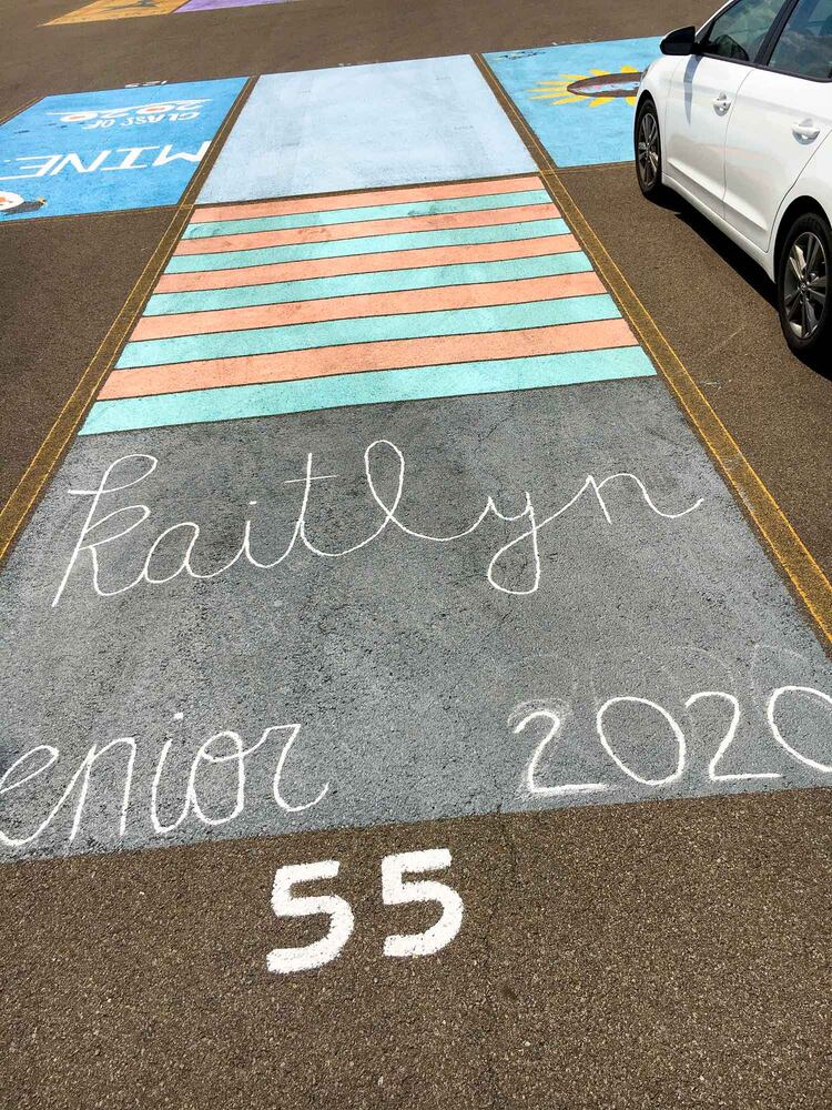 PHOTOS Lakota East seniors paint parking spots