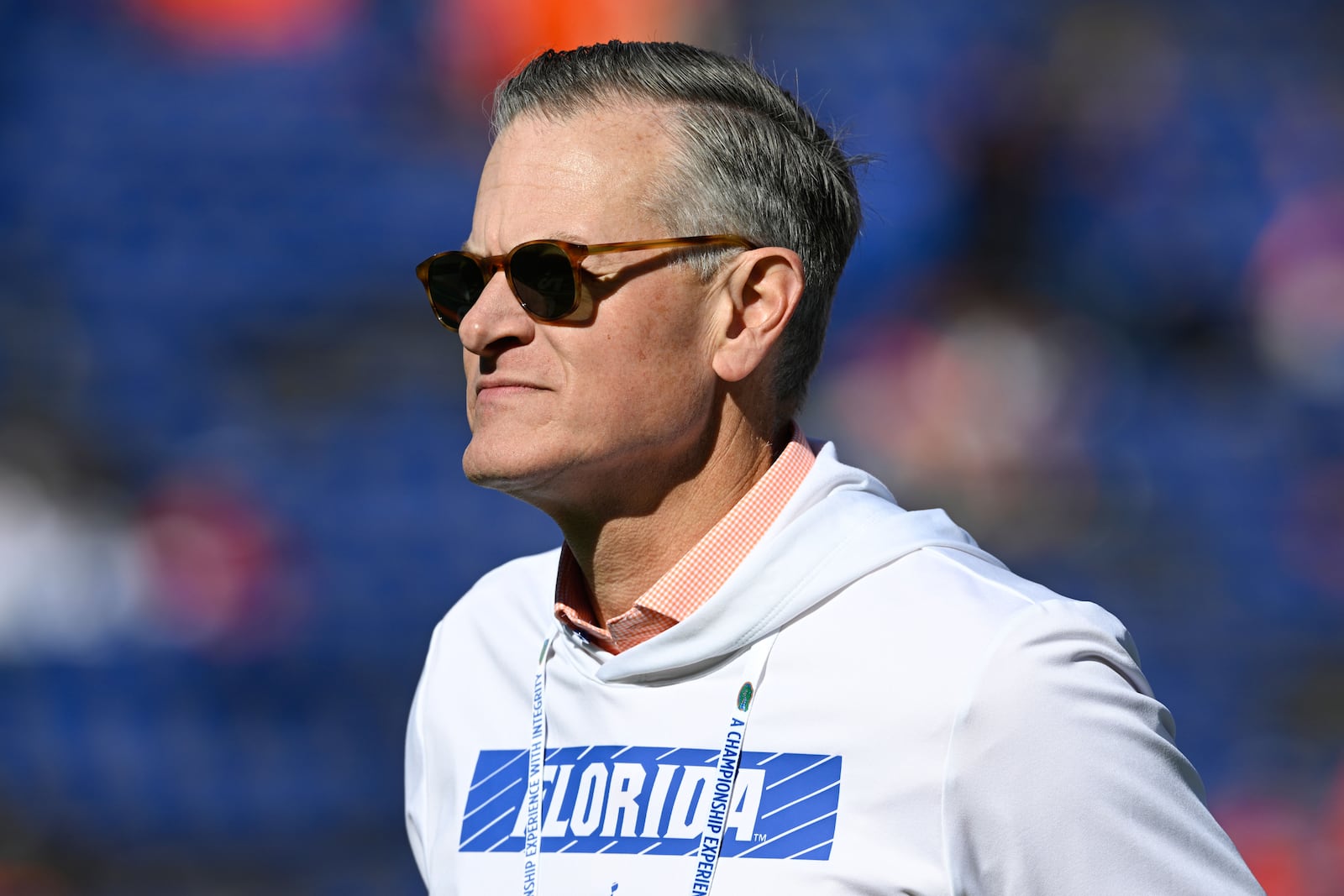 FILE - Florida athletics director Scott Stricklin walks on the field before an NCAA college football game against Mississippi, Saturday, Nov. 23, 2024, in Gainesville, Fla. (AP Photo/Phelan M. Ebenhack, File)