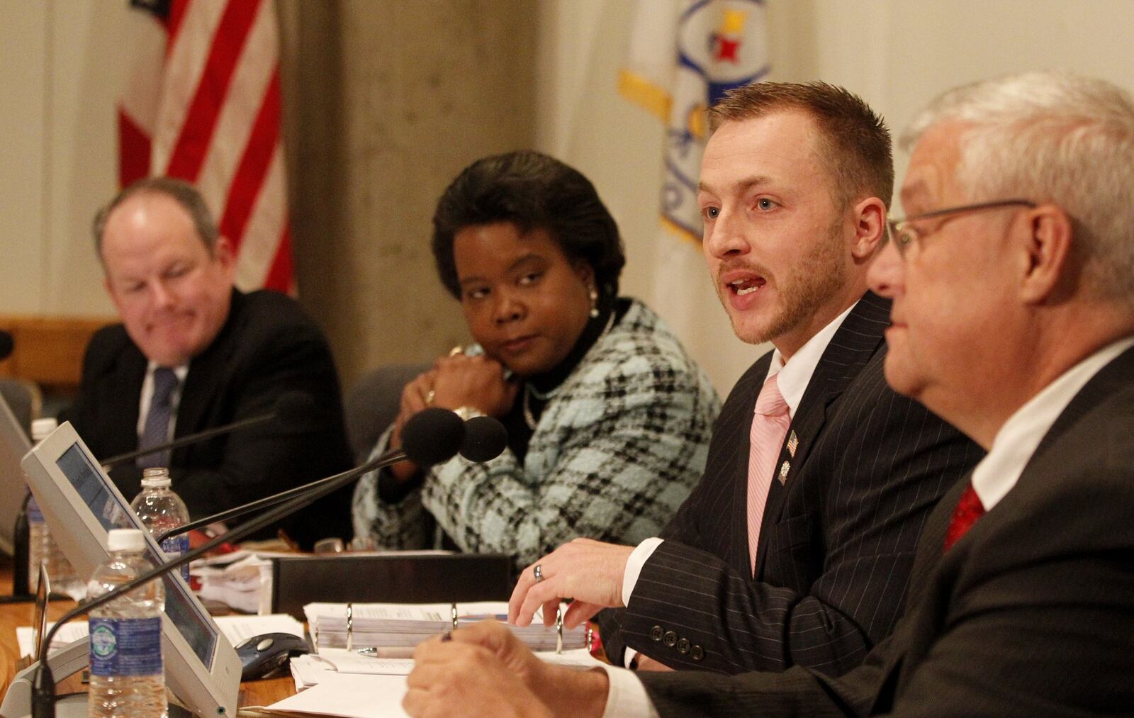 The Middletown City Council heard a budget proposal Tuesday night presented by Councilman Josh Laubach (third from left). The city is considering eliminating public safety positions to balance the budget. From left to right are Mayor Larry Mulligan, Councilwoman Anita Scott Jones, Laubach and Vice Mayor Dan Picard.