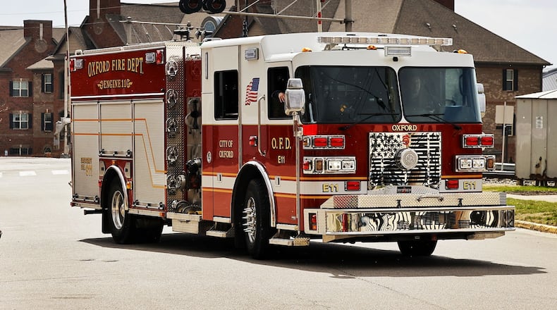 An engine from Oxford Fire Department pulls out of their headquarters on South Elm Street Monday, March 13, 2023. Oxford is seeking funds to get more firefighters on staff in the next three years. NICK GRAHAM/STAFF