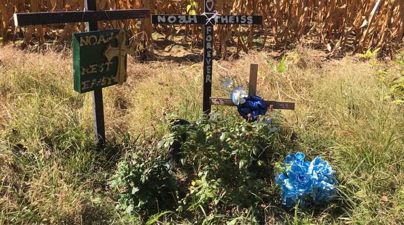 A memorial in Warren County is dedicated to Noah Theiss, 17, who died in a crash in May on Springboro Road. STAFF