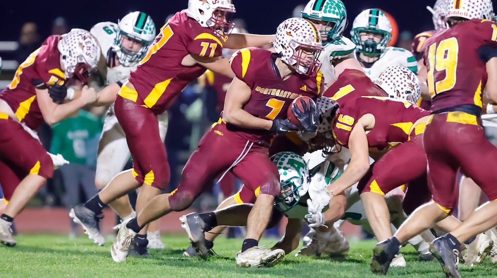 Northeastern High School senior Jackson Jones carries the ball during their game against Anna on Friday, Nov. 14 at Conover Stadium. The Rockets won 28-8. MICHAEL COOPER / STAFF
