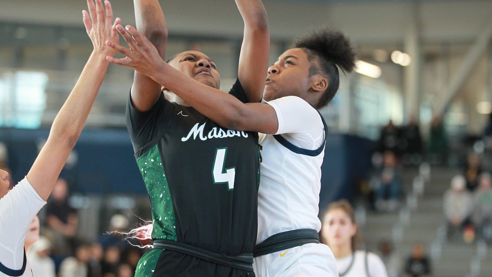 Mason High School's Madison Parrish drives to the hoop during their district final game on Feb. 22 at Fairborn High School. MARCUS HARTMAN / STAFF PHOTO