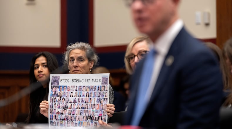 Nikita Joy of the Foundation for Aviation Safety, left, and Nadia Milleron of Sheffield, Mass., whose daughter Samya Stumo was killed in the crash of Ethiopian Airlines flight 302, listen as FAA Administrator Bryan Bedford speaks during a hearing of the Aviation Subcommittee of the House Transportation and Infrastructure Committee on Capitol Hill, Tuesday, Dec. 16, 2025, in Washington. (AP Photo/Mark Schiefelbein)
