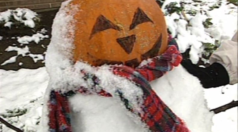 An image of a pumpkin on top of a snowman after 6.2 inches of snow fell in Cincinnati on Oct. 30-31 in 1993. WCPO/CONTRIBUTED