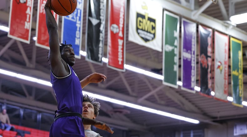 Middletown's Tywan Hall goes to the hoop during their Division I District basketball tournament game against Loveland Tuesday, Feb. 22, 2022 at Lakota West High School in West Chester Township. Middletown won 59-50. NICK GRAHAM/STAFF