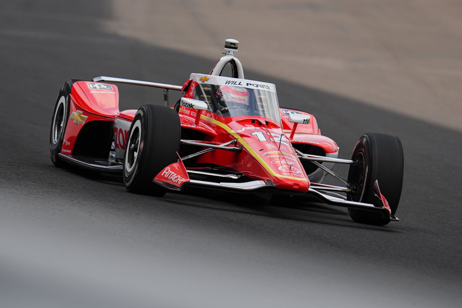 Will Power, of Australia, drives through the first turn during practice for the Indianapolis 500 auto race at Indianapolis Motor Speedway in Indianapolis, Thursday, May 15, 2025. (AP Photo/Michael Conroy)