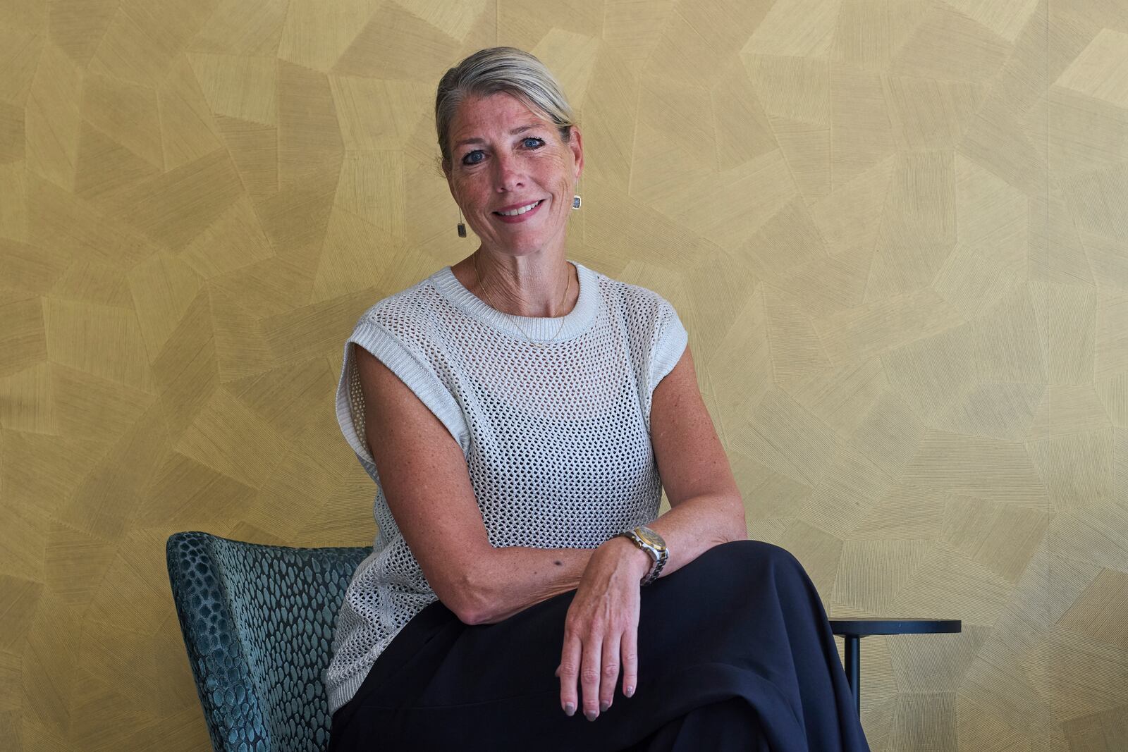 Bianca Veenhof of Gastrobar Berlage poses for a picture after an interview about the effects of security measures ahead of the NATO summit in The Hague, Netherlands, Wednesday, June 18, 2025. (AP Photo/Peter Dejong)