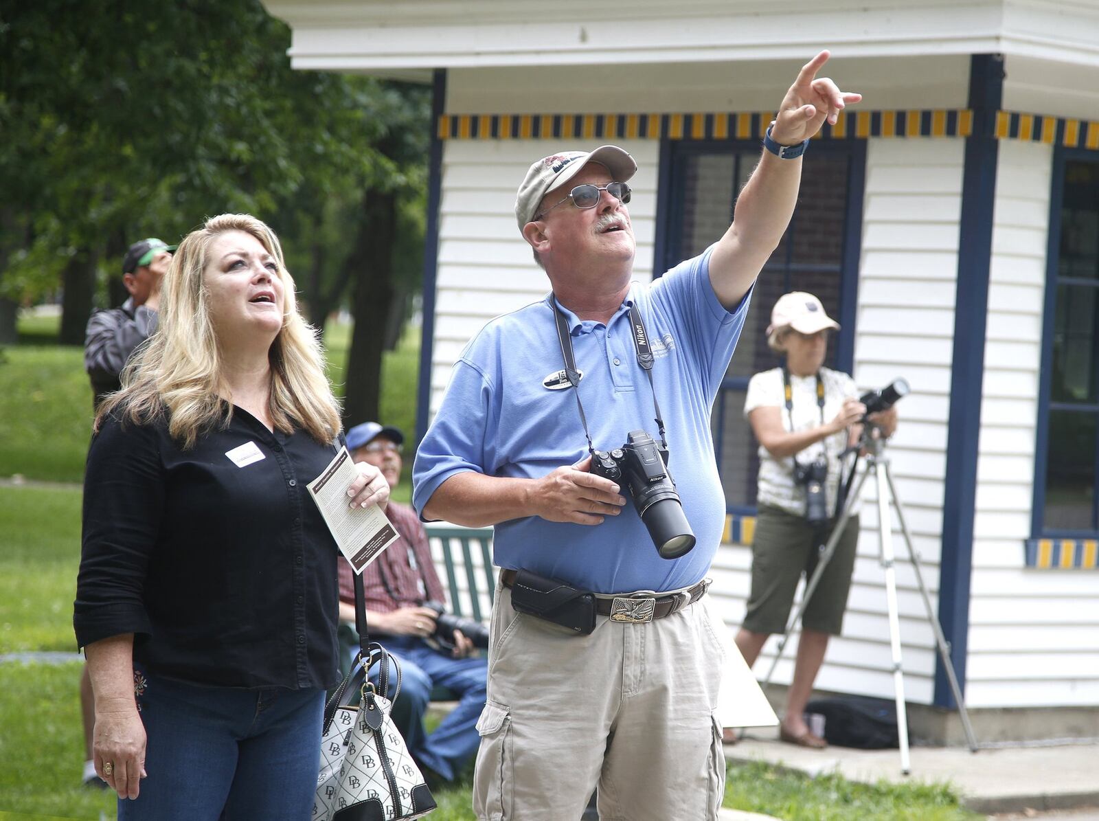 Jim Weller of Dayton points out a bald eagle nest to a visitor at Carillon Historical Park in Dayton. Two bald eagles, dubbed Orv and Willa, built a nest in the park. This is a rare opportunity to observe bald eagles up close, Weller said. LISA POWELL / STAFF