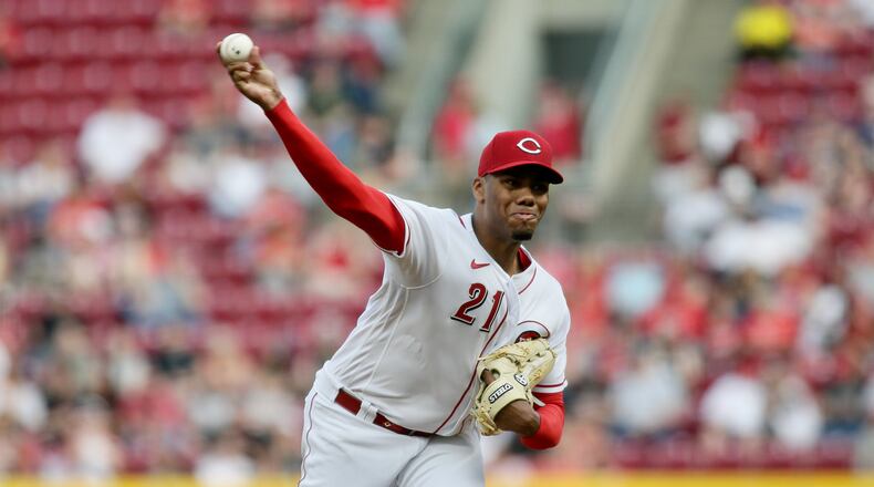Reds starter Hunter Greene pitches against the Cardinals on Friday, April 22, 2022, at Great American Ball Park in Cincinnati. David Jablonski/Staff