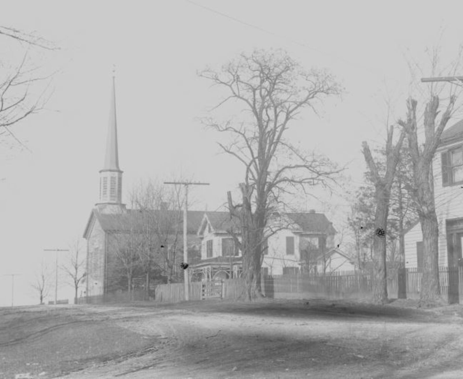This early picture of Monroe United Methodist Church also shows the parsonage. The church is celebrating its 200th birthday with a special service Sunday. SUBMITTED PHOTO