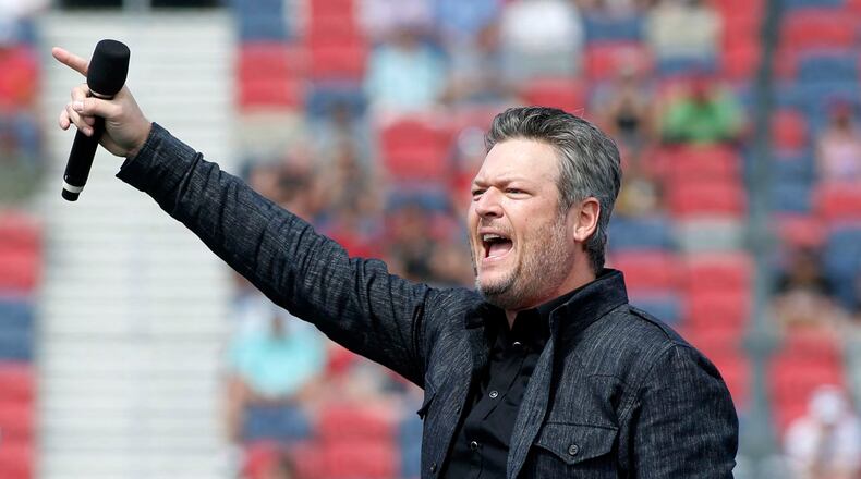 Country music singer and television personality Blake Shelton performs prior to a NASCAR Cup Series auto race at Phoenix Raceway, Sunday, March 8, 2020, in Avondale, Ariz. He will headline a virtual drive-in concert on July 25. (AP Photo)