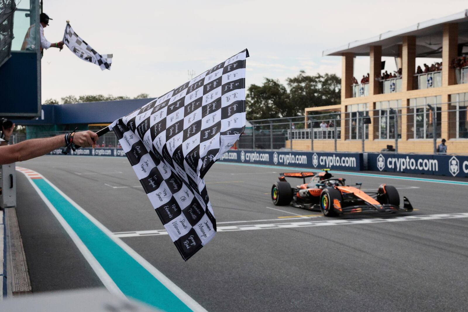 McLaren driver Oscar Piastri of Australia crosses the finish to win the Formula One Miami Grand Prix auto race Sunday, May 4, 2025, in Miami Gardens. Fla. (Shawn Thew/Pool Photo via AP)