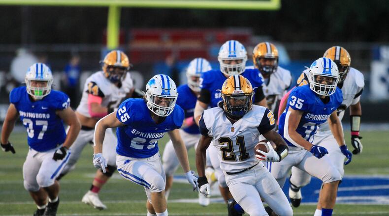 Springfield's Jayvin Norman runs against Springboro on Friday, Oct. 1, 2021, at CareFlight Field in Springboro. David Jablonski/Staff