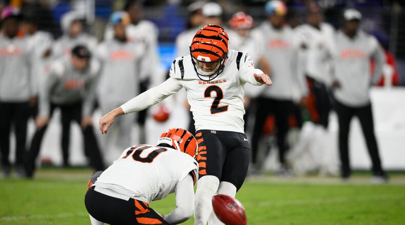 Cincinnati Bengals' Evan McPherson kicks a field goal during the first half of an NFL football game against the Baltimore Ravens, Sunday, Oct. 9, 2022, in Baltimore. (AP Photo/Nick Wass)
