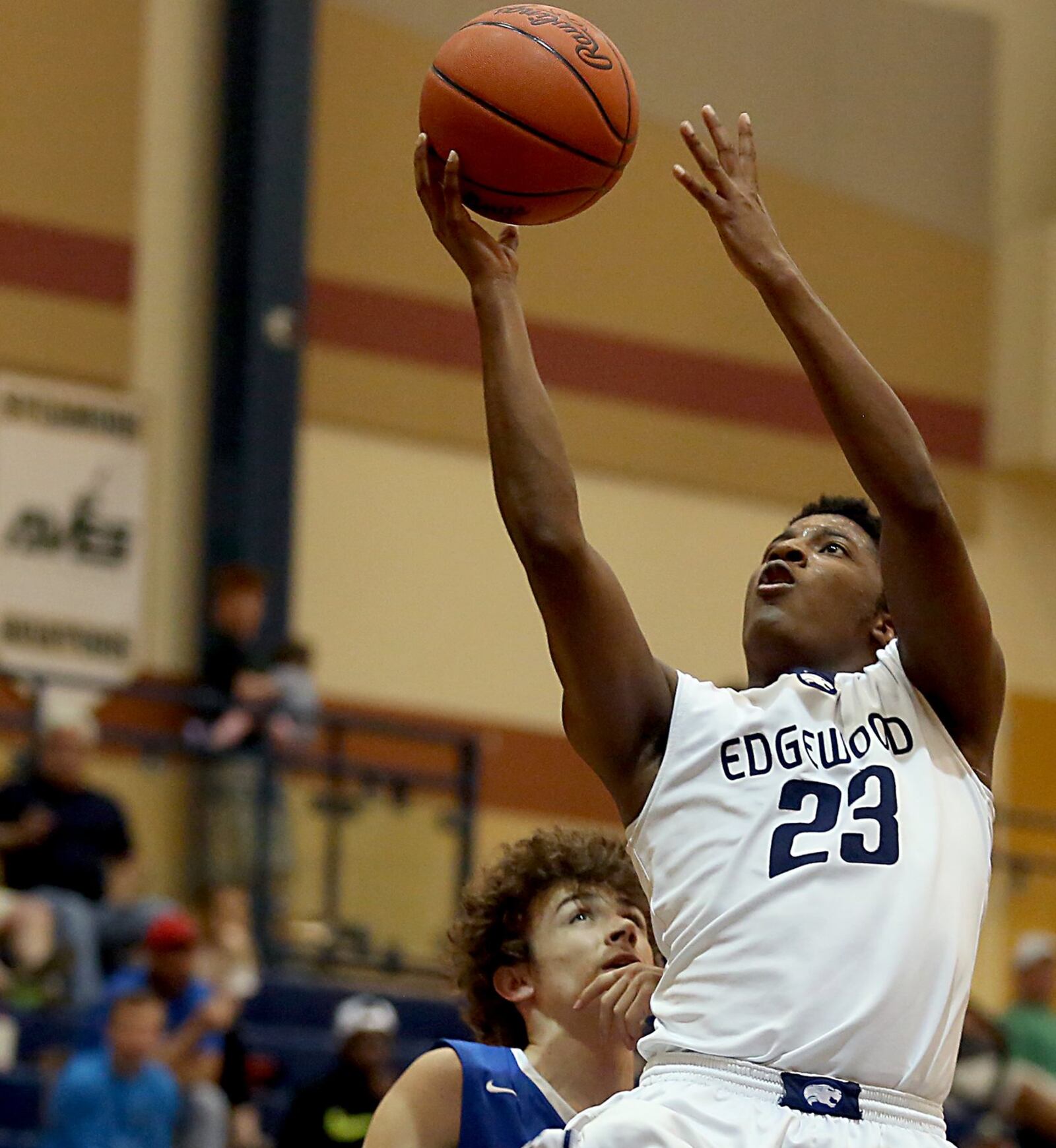 Edgewood’s Eddie Driskell soars past Middletown Christian’s Ronin Koeller for a shot during the inaugural All-Butler County All-Star boys basketball game at the Hamilton Athletic Center on Saturday. CONTRIBUTED PHOTO BY E.L. HUBBARD