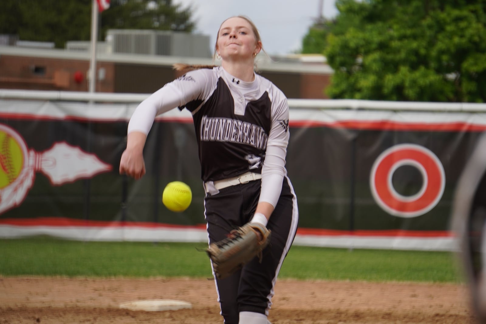 Lakota East's Kaleigh Crawford sends a practice pitch to the plate against Fairfield on Monday at Creekside Middle School. CHRIS VOGT/CONTRIBUTED PHOTO