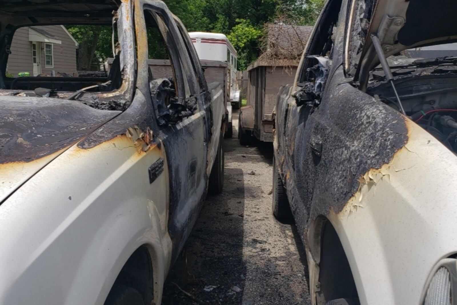 A neighbor has created a GoFundMe page for her neighbor, Charles Crawford, Jr., whose work truck was set on fire. The fire spread to a second vehicle he owned. PROVIDED