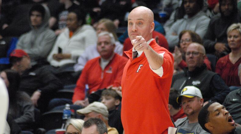 Fairfield coach DJ Wyrick directs his players on the floor during a Division I district final contest against Wayne on Saturday at University of Dayton Arena. Chris Vogt/CONTRIBUTED