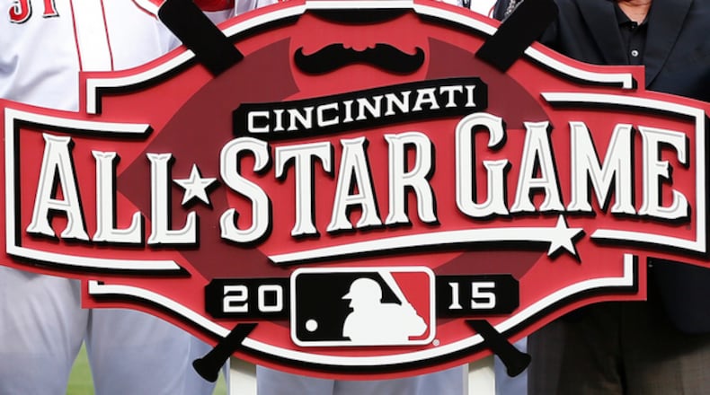 Cincinnati Reds owner Bob Castellini and general manager Walt Jocketty unveil the 2015 All Star Game logo prior to the game against the Cleveland Indians at Great American Ball Park on August 6, 2014 in Cincinnati, Ohio. (Photo by Joe Robbins/Getty Images)